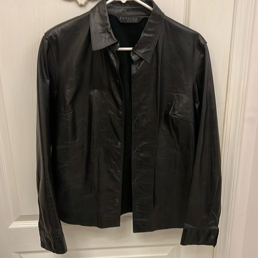 Black leather shirt.
